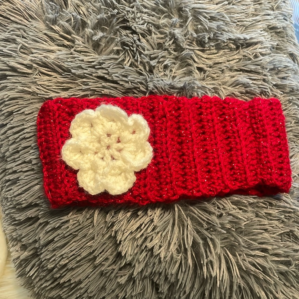 Sparkle-tastic, crocheted, red winter headband with white flower accent
